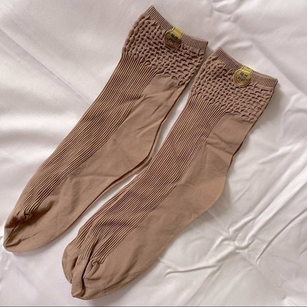 SET OF 2 NUDE SOCKS